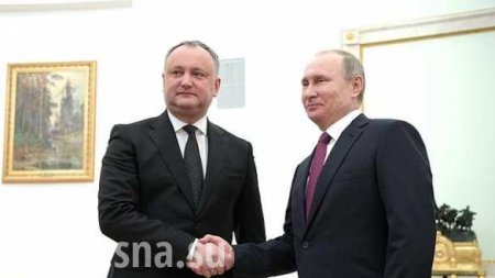 Gesture or Joke? Putin gives Dodon map of Moldova including Ukraine, Romania